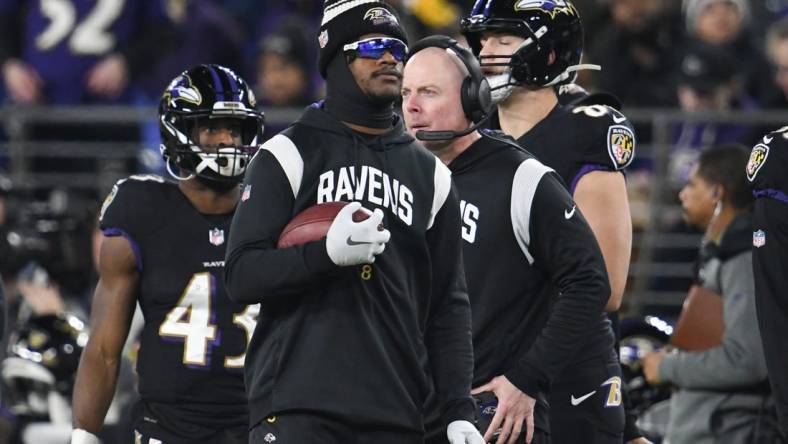 Jan 1, 2023; Baltimore, Maryland, USA;  Baltimore Ravens quarterback Lamar Jackson (8) stands on the sideline during the first half against the Pittsburgh Steelers at M&T Bank Stadium. Mandatory Credit: Tommy Gilligan-USA TODAY Sports