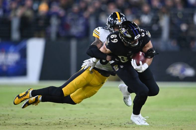 Jan 1, 2023; Baltimore, Maryland, USA; Pittsburgh Steelers safety Terrell Edmunds (34) tackles Baltimore Ravens tight end Mark Andrews (89)  during the first half at M&T Bank Stadium. Mandatory Credit: Tommy Gilligan-USA TODAY Sports