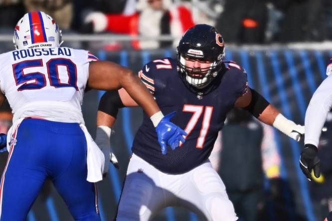 Dec 24, 2022; Chicago, Illinois, USA;  Chicago Bears offensive lineman Riley Reiff (71) blocks against the Buffalo Bills at Soldier Field. Mandatory Credit: Jamie Sabau-USA TODAY Sports