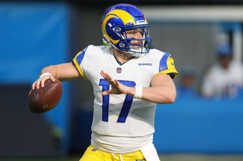 Jan 1, 2023; Inglewood, California, USA; Los Angeles Rams quarterback Baker Mayfield (17) throws the ball in the first half against the Los Angeles Chargers at SoFi Stadium. Mandatory Credit: Kirby Lee-USA TODAY Sports