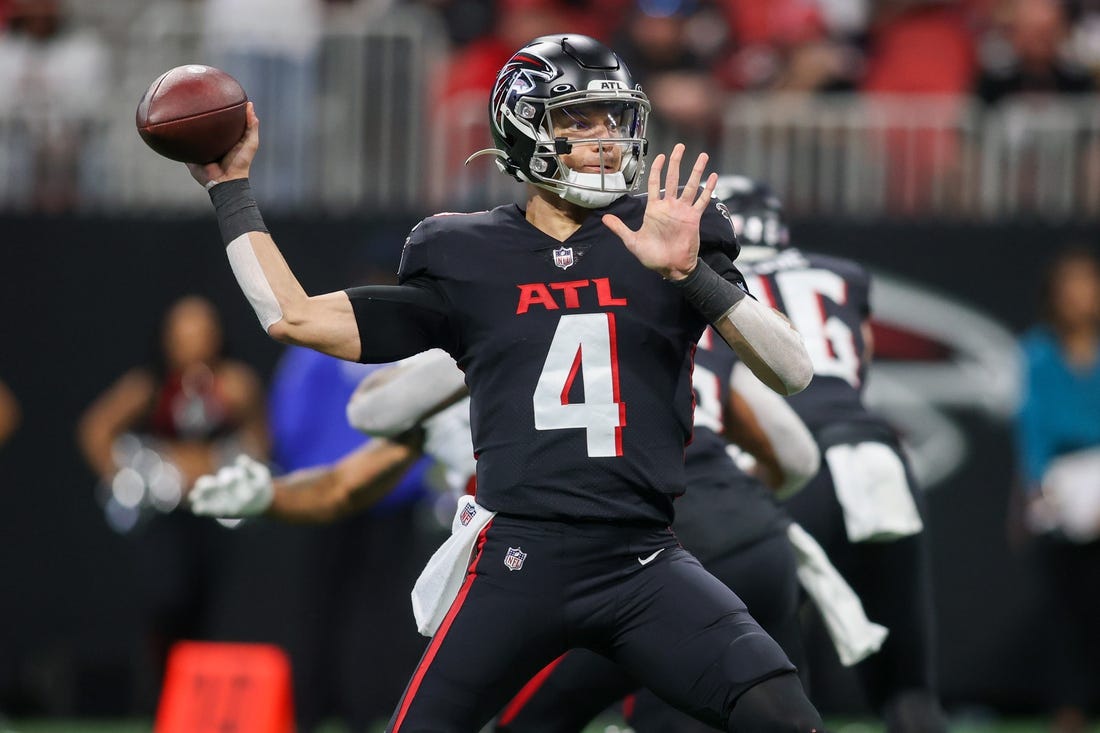 Jan 8, 2023; Atlanta, Georgia, USA; Atlanta Falcons quarterback Desmond Ridder (4) throws a pass against the Tampa Bay Buccaneers in the second half at Mercedes-Benz Stadium. Mandatory Credit: Brett Davis-USA TODAY Sports