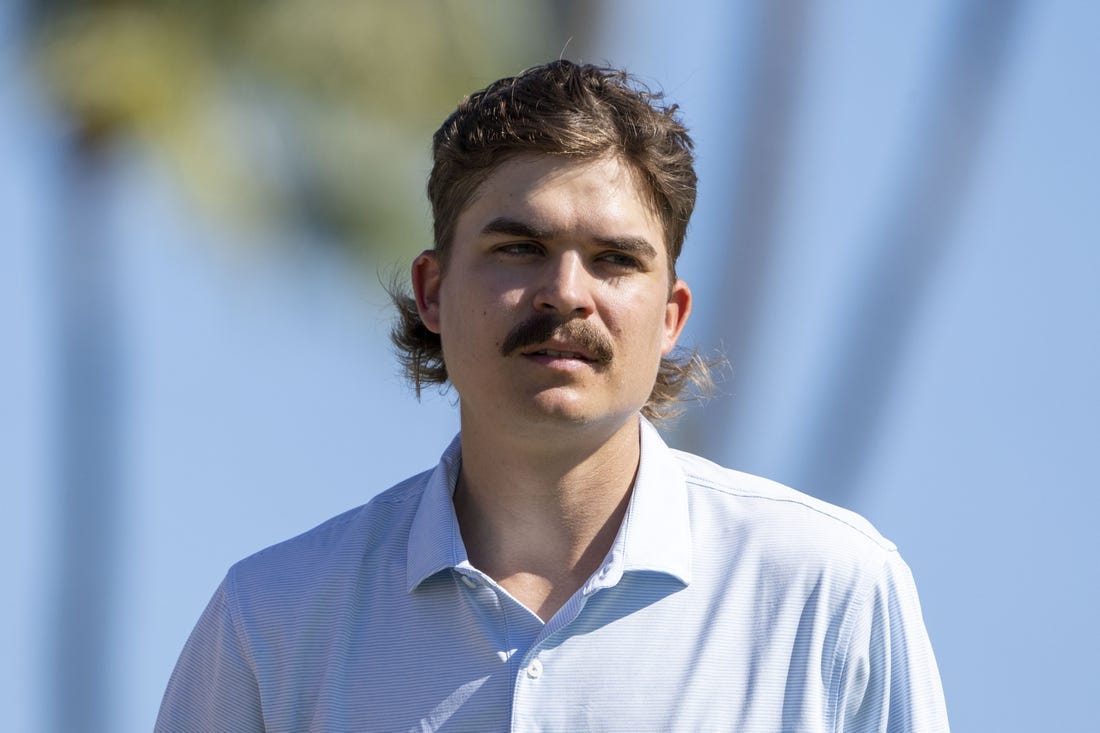 January 12, 2023; Honolulu, Hawaii, USA;  Carson Young on the 18th hole during the first round of the Sony Open in Hawaii golf tournament at Waialae Country Club. Mandatory Credit: Kyle Terada-USA TODAY Sports