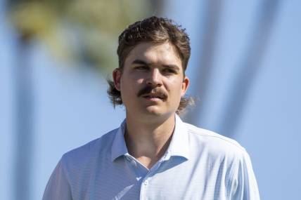 January 12, 2023; Honolulu, Hawaii, USA;  Carson Young on the 18th hole during the first round of the Sony Open in Hawaii golf tournament at Waialae Country Club. Mandatory Credit: Kyle Terada-USA TODAY Sports