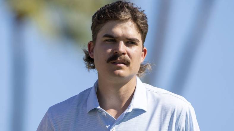 January 12, 2023; Honolulu, Hawaii, USA;  Carson Young on the 18th hole during the first round of the Sony Open in Hawaii golf tournament at Waialae Country Club. Mandatory Credit: Kyle Terada-USA TODAY Sports