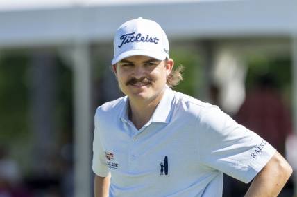 January 12, 2023; Honolulu, Hawaii, USA;  Carson Young on the 18th hole during the first round of the Sony Open in Hawaii golf tournament at Waialae Country Club. Mandatory Credit: Kyle Terada-USA TODAY Sports