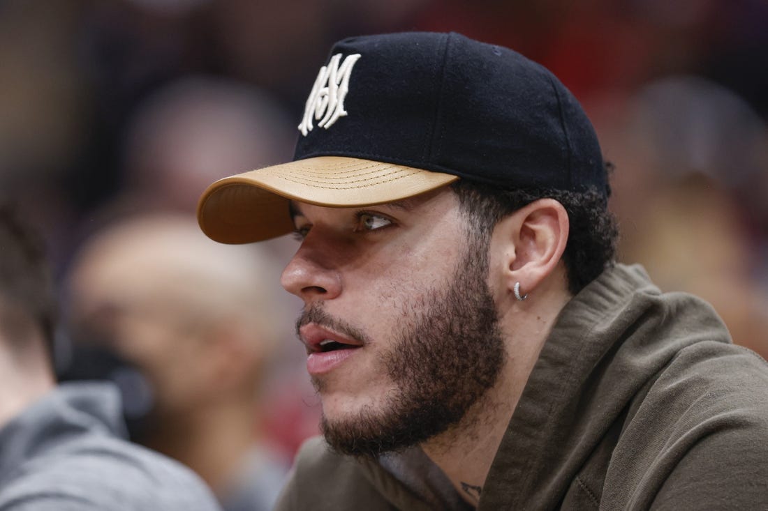 Jan 13, 2023; Chicago, Illinois, USA; Injured Chicago Bulls guard Lonzo Ball sits on the bench during the first half against the Oklahoma City Thunder at United Center. Mandatory Credit: Kamil Krzaczynski-USA TODAY Sports