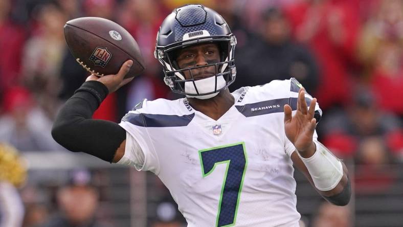 Jan 14, 2023; Santa Clara, California, USA; Seattle Seahawks quarterback Geno Smith (7) makes a throw in the second quarter of a wild card game against the San Francisco 49ers at Levi's Stadium. Mandatory Credit: Cary Edmondson-USA TODAY Sports