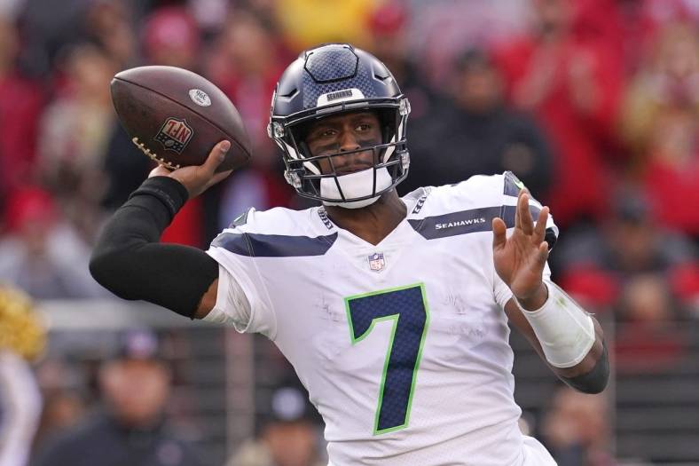 Jan 14, 2023; Santa Clara, California, USA; Seattle Seahawks quarterback Geno Smith (7) makes a throw in the second quarter of a wild card game against the San Francisco 49ers at Levi's Stadium. Mandatory Credit: Cary Edmondson-USA TODAY Sports