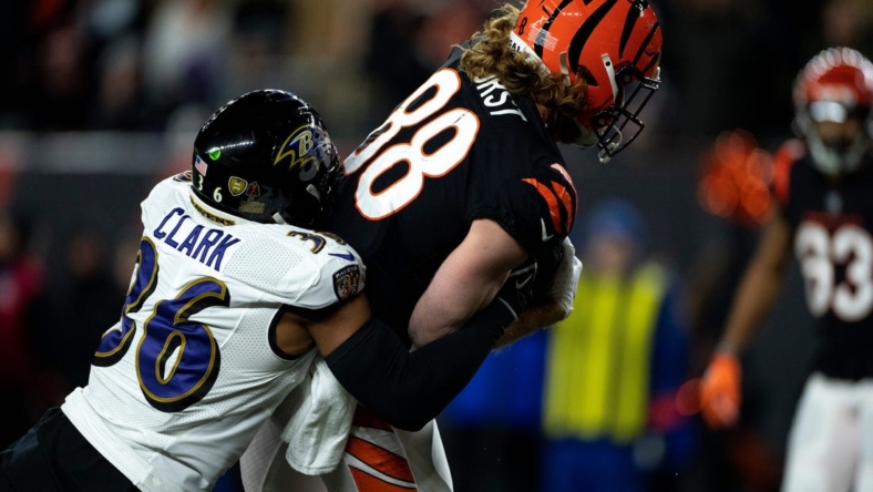 Baltimore Ravens safety Chuck Clark (36) tackles Cincinnati Bengals tight end Hayden Hurst (88) at the inch yard line in the third quarter during an NFL wild-card playoff football game between the Baltimore Ravens and the Cincinnati Bengals, Sunday, Jan. 15, 2023, at Paycor Stadium in Cincinnati.

Baltimore Ravens At Cincinnati Bengals Afc Wild Card Jan 15 205