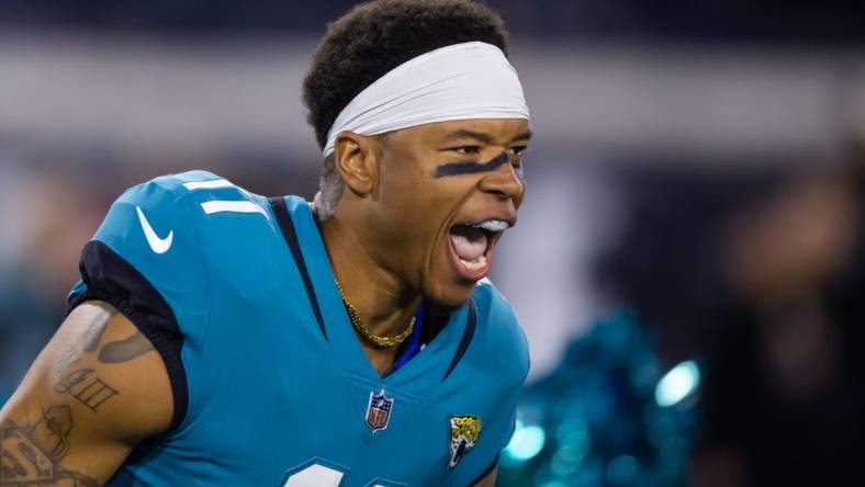 Jan 14, 2023; Jacksonville, Florida, USA; Jacksonville Jaguars wide receiver Marvin Jones Jr. (11) reacts against the Los Angeles Chargers during a wild card playoff game at TIAA Bank Field. Mandatory Credit: Mark J. Rebilas-USA TODAY Sports