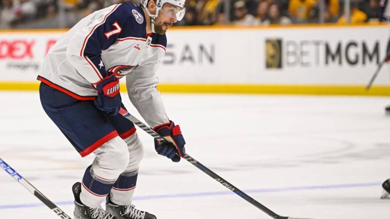 Jan 17, 2023; Nashville, Tennessee, USA;  Columbus Blue Jackets center Sean Kuraly (7) skates against the Nashville Predators during the second period at Bridgestone Arena. Mandatory Credit: Steve Roberts-USA TODAY Sports