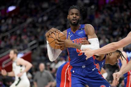 Jan 23, 2023; Detroit, Michigan, USA;  Detroit Pistons guard Nerlens Noel (9) pulls down a rebound against the Milwaukee Bucks in the third quarter at Little Caesars Arena. Mandatory Credit: Lon Horwedel-USA TODAY Sports