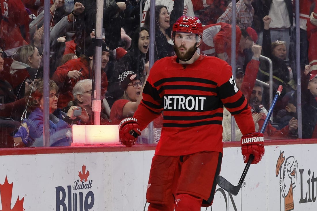 Jan 24, 2023; Detroit, Michigan, USA;  Detroit Red Wings center Michael Rasmussen (27) celebrates after scoring in the second period against the San Jose Sharks at Little Caesars Arena. Mandatory Credit: Rick Osentoski-USA TODAY Sports