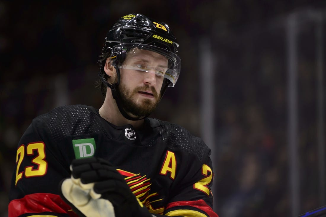 Jan 24, 2023; Vancouver, British Columbia, CAN;  Vancouver Canucks defenseman Oliver Ekman-Larsson (23) awaits the start of play against the Chicago Blackhawks during the second period at Rogers Arena. Mandatory Credit: Anne-Marie Sorvin-USA TODAY Sports