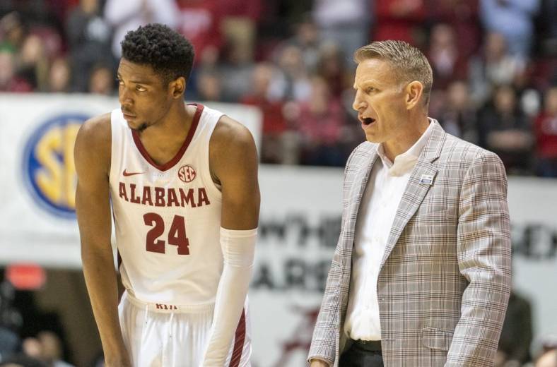 Jan 25, 2023; Tuscaloosa, Alabama, USA; Alabama Crimson Tide head coach Nate Oats talks to forward Brandon Miller (24) during the second half against Mississippi State Bulldogs at Coleman Coliseum. Mandatory Credit: Marvin Gentry-USA TODAY Sports