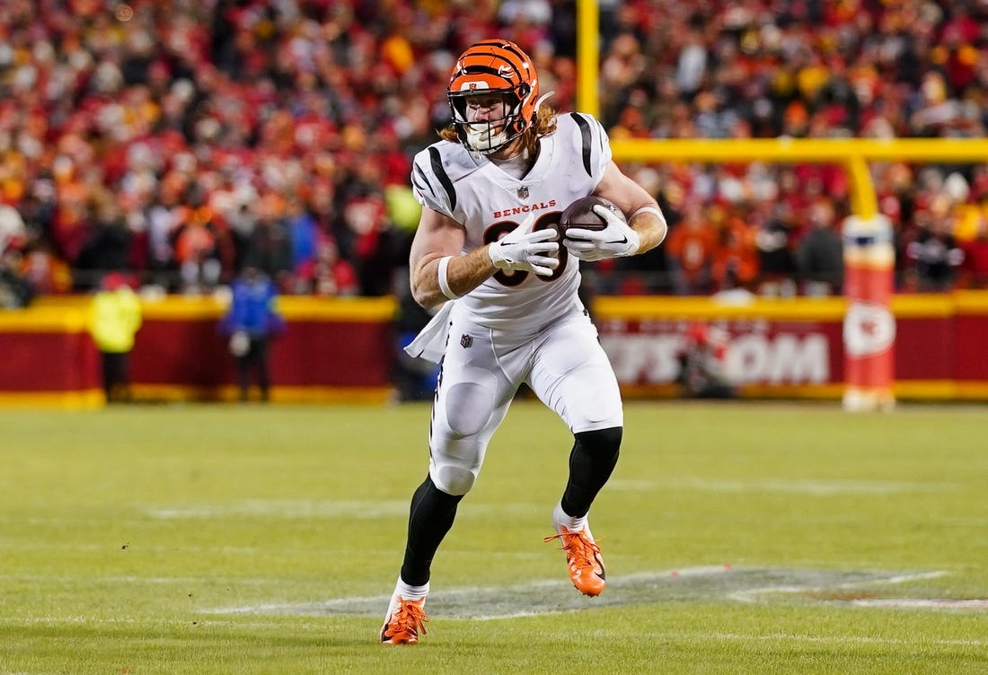 Jan 29, 2023; Kansas City, Missouri, USA; Cincinnati Bengals tight end Hayden Hurst (88) runs with the ball during the first half of the AFC Championship game against the Kansas City Chiefs at GEHA Field at Arrowhead Stadium. Mandatory Credit: Jay Biggerstaff-USA TODAY Sports