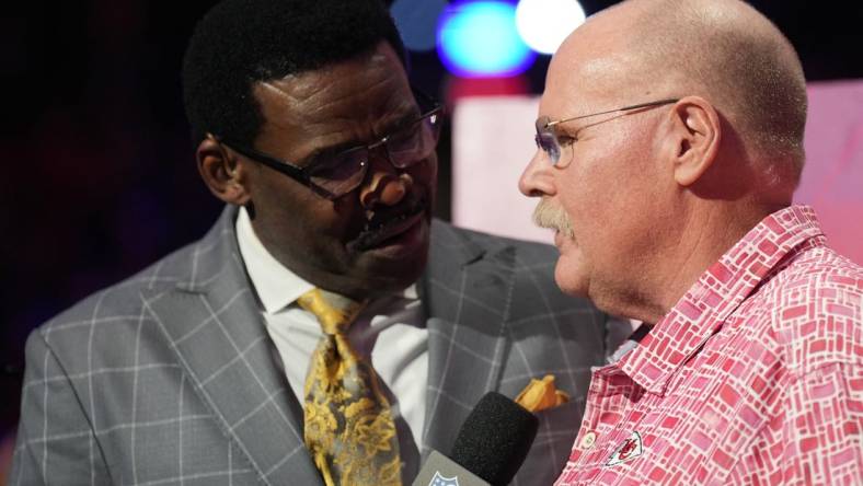 Feb 6, 2023; Phoenix, AZ, USA; Kansas City Chiefs head coach Andy Reid speaks with NFL Network reporter Michael Irvin during Super Bowl Opening Night at Footprint Center. Mandatory Credit: Joe Camporeale-USA TODAY Sports