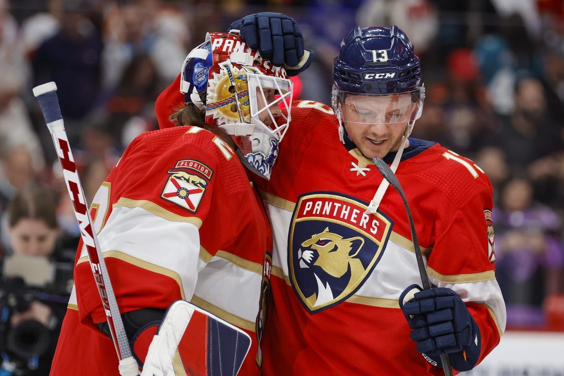 Feb 9, 2023; Sunrise, Florida, USA; Florida Panthers center Sam Reinhart (13) celebrates with goaltender Sergei Bobrovsky (72) after winning the game against the San Jose Sharks at FLA Live Arena. Mandatory Credit: Sam Navarro-USA TODAY Sports