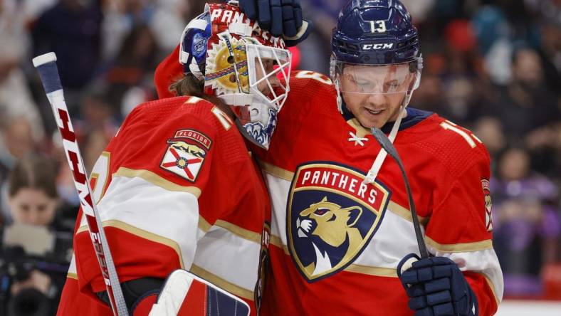 Feb 9, 2023; Sunrise, Florida, USA; Florida Panthers center Sam Reinhart (13) celebrates with goaltender Sergei Bobrovsky (72) after winning the game against the San Jose Sharks at FLA Live Arena. Mandatory Credit: Sam Navarro-USA TODAY Sports