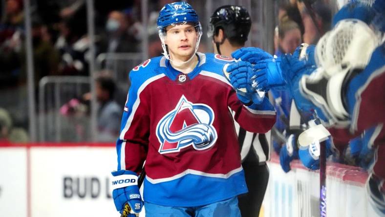 Feb 14, 2023; Denver, Colorado, USA; Colorado Avalanche left wing Artturi Lehkonen (62) celebrates a score in first period against the Tampa Bay Lightning at Ball Arena. Mandatory Credit: Ron Chenoy-USA TODAY Sports