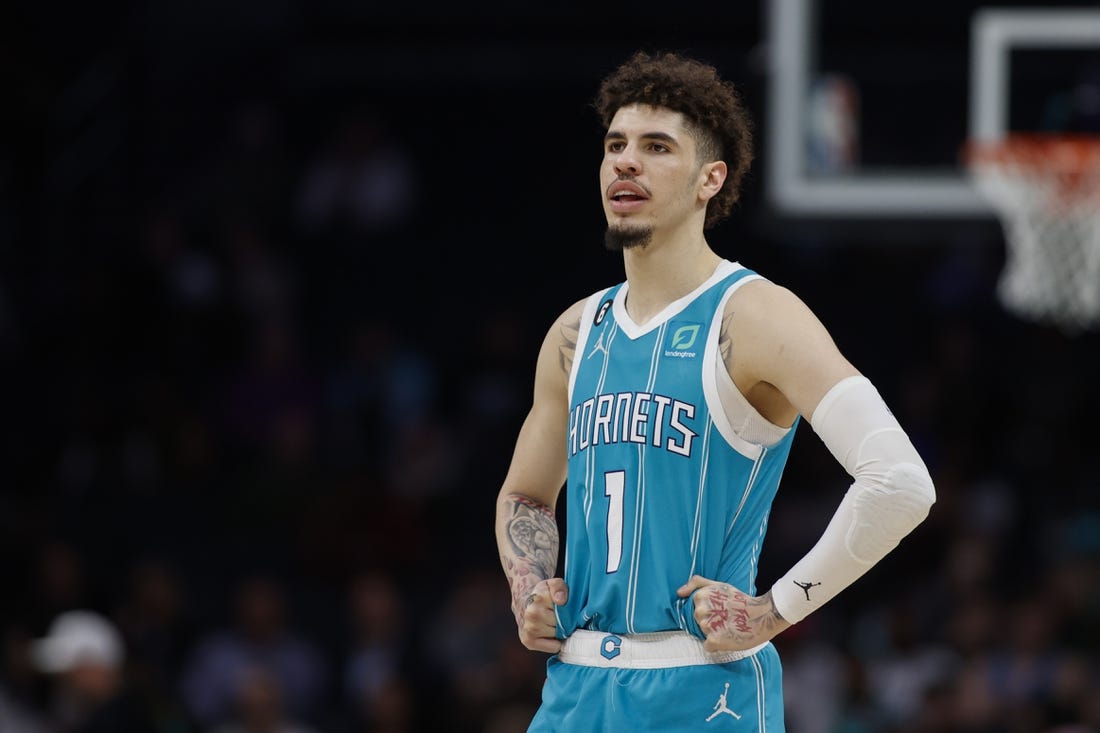 Feb 15, 2023; Charlotte, North Carolina, USA; Charlotte Hornets guard LaMelo Ball (1) stands on the court during the second half against the San Antonio Spurs at Spectrum Center. The Charlotte Hornets won 120-110. Mandatory Credit: Nell Redmond-USA TODAY Sports