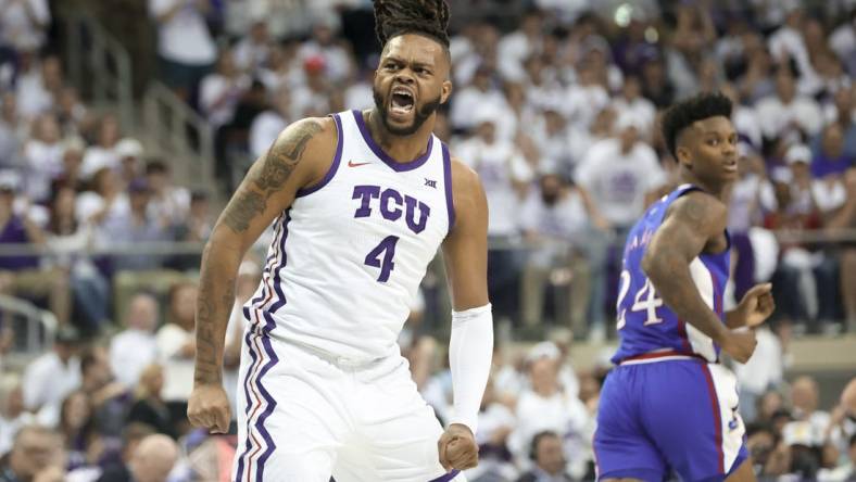 Feb 20, 2023; Fort Worth, Texas, USA;  TCU Horned Frogs center Eddie Lampkin Jr. (4) reacts after scoring during the first half Kansas Jayhawks at Ed and Rae Schollmaier Arena. Mandatory Credit: Kevin Jairaj-USA TODAY Sports