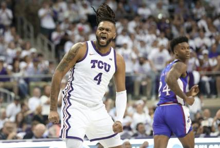 Feb 20, 2023; Fort Worth, Texas, USA;  TCU Horned Frogs center Eddie Lampkin Jr. (4) reacts after scoring during the first half Kansas Jayhawks at Ed and Rae Schollmaier Arena. Mandatory Credit: Kevin Jairaj-USA TODAY Sports