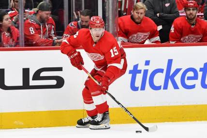 Feb 21, 2023; Washington, District of Columbia, USA; Detroit Red Wings left wing Jakub Vrana (15) handles the puck against the Washington Capitals during the second period at Capital One Arena. Mandatory Credit: Brad Mills-USA TODAY Sports