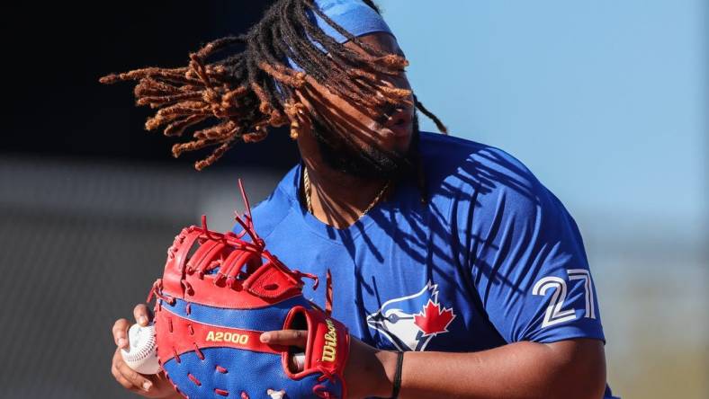 Feb 22, 2023; Dunedin, FL, USA;  Toronto Blue Jays first baseman Vladimir Guerrero Jr. (27) participates in spring workouts at the Blue Jays Player Development Complex. Mandatory Credit: Nathan Ray Seebeck-USA TODAY Sports