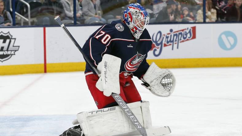 Feb 25, 2023; Columbus, Ohio, USA; Columbus Blue Jackets goalie Joonas Korpisalo (70) makes a save against the Edmonton Oilers during the first period at Nationwide Arena. Mandatory Credit: Russell LaBounty-USA TODAY Sports