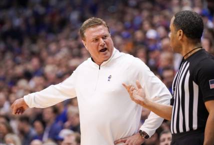 Feb 25, 2023; Lawrence, Kansas, USA; Kansas Jayhawks head coach Bill Self talks with an official against the West Virginia Mountaineers during the first half at Allen Fieldhouse. Mandatory Credit: Denny Medley-USA TODAY Sports