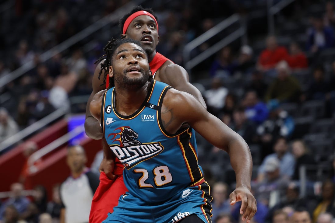 Feb 25, 2023; Detroit, Michigan, USA;Detroit Pistons center Isaiah Stewart (28) and Toronto Raptors forward Pascal Siakam (43) look for a rebound in the first half at Little Caesars Arena. Mandatory Credit: Rick Osentoski-USA TODAY Sports