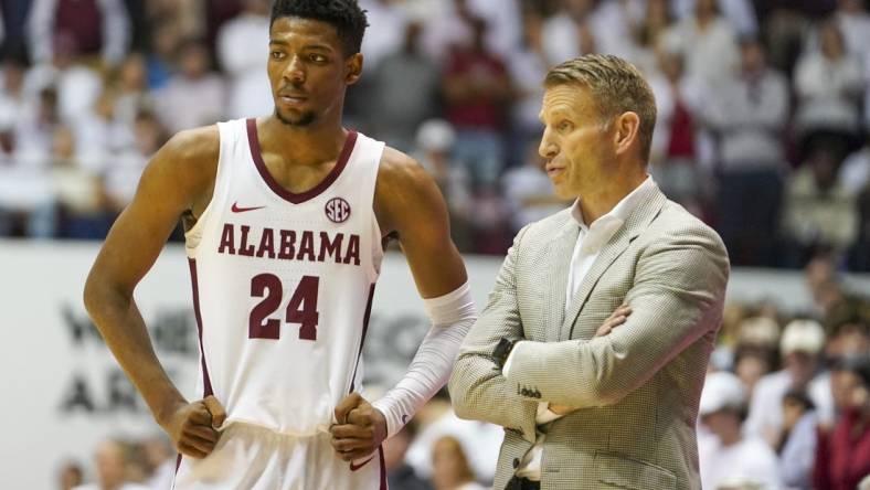 Feb 25, 2023; Tuscaloosa, Alabama, USA; Alabama Crimson Tide forward Brandon Miller (24) talks to head coach Nate Oats during the second half against the Arkansas Razorbacks at Coleman Coliseum. Mandatory Credit: Marvin Gentry-USA TODAY Sports