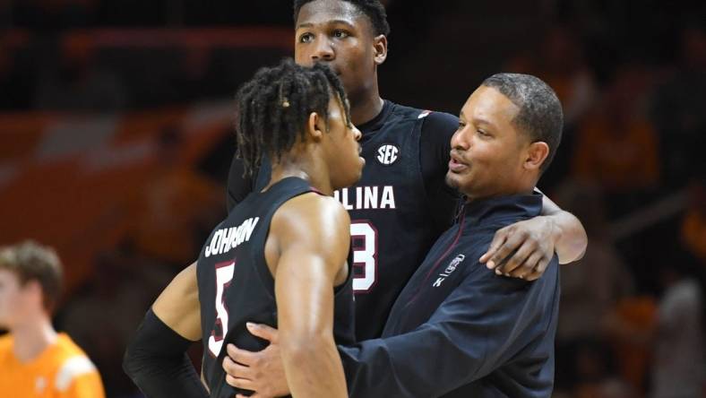 South Carolina Head Coach Lamont Paris hugs South Carolina guard Meechie Johnson (5) and South Carolina forward Gregory "GG" Jackson II (23) during an NCAA college basketball game between the South Carolina Game Cocks and the Tennessee Volunteers in Thompson-Boling Arena in Knoxville, Saturday Feb. 25, 2023. Tennessee defeated South Carolina 85-45.

Volssc0225 1592