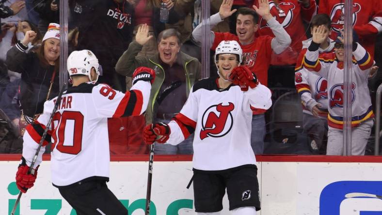 Feb 25, 2023; Newark, New Jersey, USA; New Jersey Devils center Dawson Mercer (91) celebrates his goal against the Philadelphia Flyers during the second period at Prudential Center. Mandatory Credit: Ed Mulholland-USA TODAY Sports