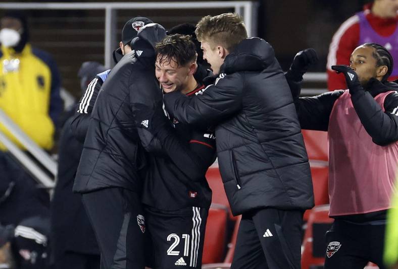 Feb 25, 2023; Washington, District of Columbia, USA; D.C. United forward Theodore Ku-Dipietro (21) reacts after scoring a goal against Toronto FC during the second half at Audi Field. Mandatory Credit: Geoff Burke-USA TODAY Sports