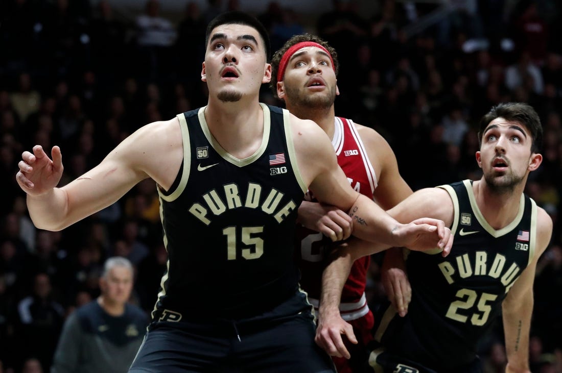 Purdue Boilermakers center Zach Edey (15) and Purdue Boilermakers guard Ethan Morton (25) box out Indiana Hoosiers forward Race Thompson (25) during the NCAA men   s basketball game, Saturday, Feb. 25, 2023, at Mackey Arena in West Lafayette, Ind. Indiana Hoosiers won 79-71.

Purdueiumbb022523 Am554