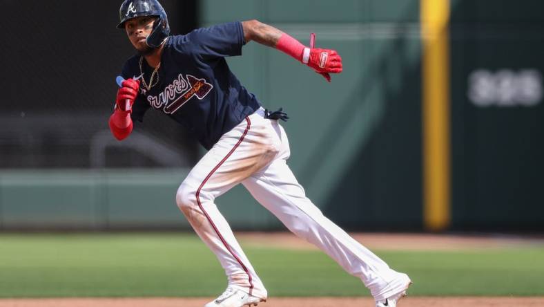 Feb 27, 2023; North Port, Florida, USA;  Atlanta Braves second baseman Orlando Arcia (11) on base against the Toronto Blue Jays in the fifth inning during spring training at CoolToday Park. Mandatory Credit: Nathan Ray Seebeck-USA TODAY Sports