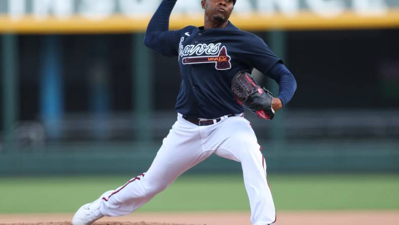 Feb 27, 2023; North Port, Florida, USA;  Atlanta Braves relief pitcher Raisel Iglesias (26) throws a pitch against the Toronto Blue Jays in the fifth inning during spring training at CoolToday Park. Mandatory Credit: Nathan Ray Seebeck-USA TODAY Sports