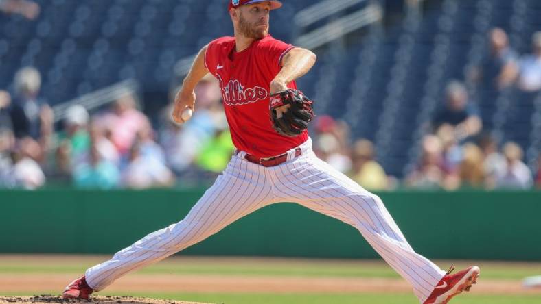 Feb 28, 2023; Clearwater, Florida, USA;  Philadelphia Phillies starting pitcher Zack Wheeler (45) throws a pitch against the Toronto Blue Jays in the first inning during spring training at BayCare Ballpark. Mandatory Credit: Nathan Ray Seebeck-USA TODAY Sports