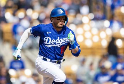 Feb 26, 2023; Phoenix, Arizona, USA; Los Angeles Dodgers infielder Miguel Rojas against the Chicago Cubs during a spring training game at Camelback Ranch-Glendale. Mandatory Credit: Mark J. Rebilas-USA TODAY Sports