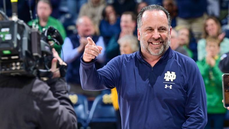 Mar 1, 2023; South Bend, Indiana, USA; Notre Dame Fighting Irish head coach Mike Brey enters the Purcell Pavilion before the game against the Pittsburgh Panthers. Mandatory Credit: Matt Cashore-USA TODAY Sports