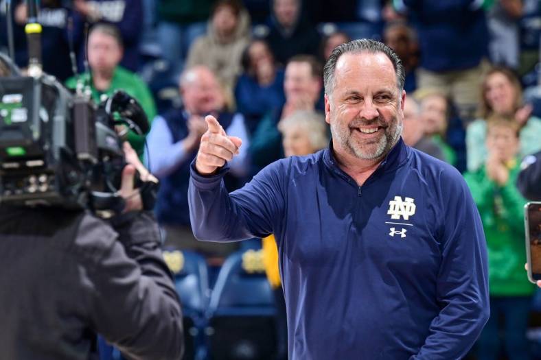 Mar 1, 2023; South Bend, Indiana, USA; Notre Dame Fighting Irish head coach Mike Brey enters the Purcell Pavilion before the game against the Pittsburgh Panthers. Mandatory Credit: Matt Cashore-USA TODAY Sports