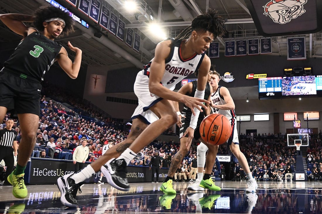 Mar 1, 2023; Spokane, Washington, USA; Gonzaga Bulldogs guard Hunter Sallis (5) rebounds the ball against the Chicago State Cougars in the first half at McCarthey Athletic Center. Mandatory Credit: James Snook-USA TODAY Sports