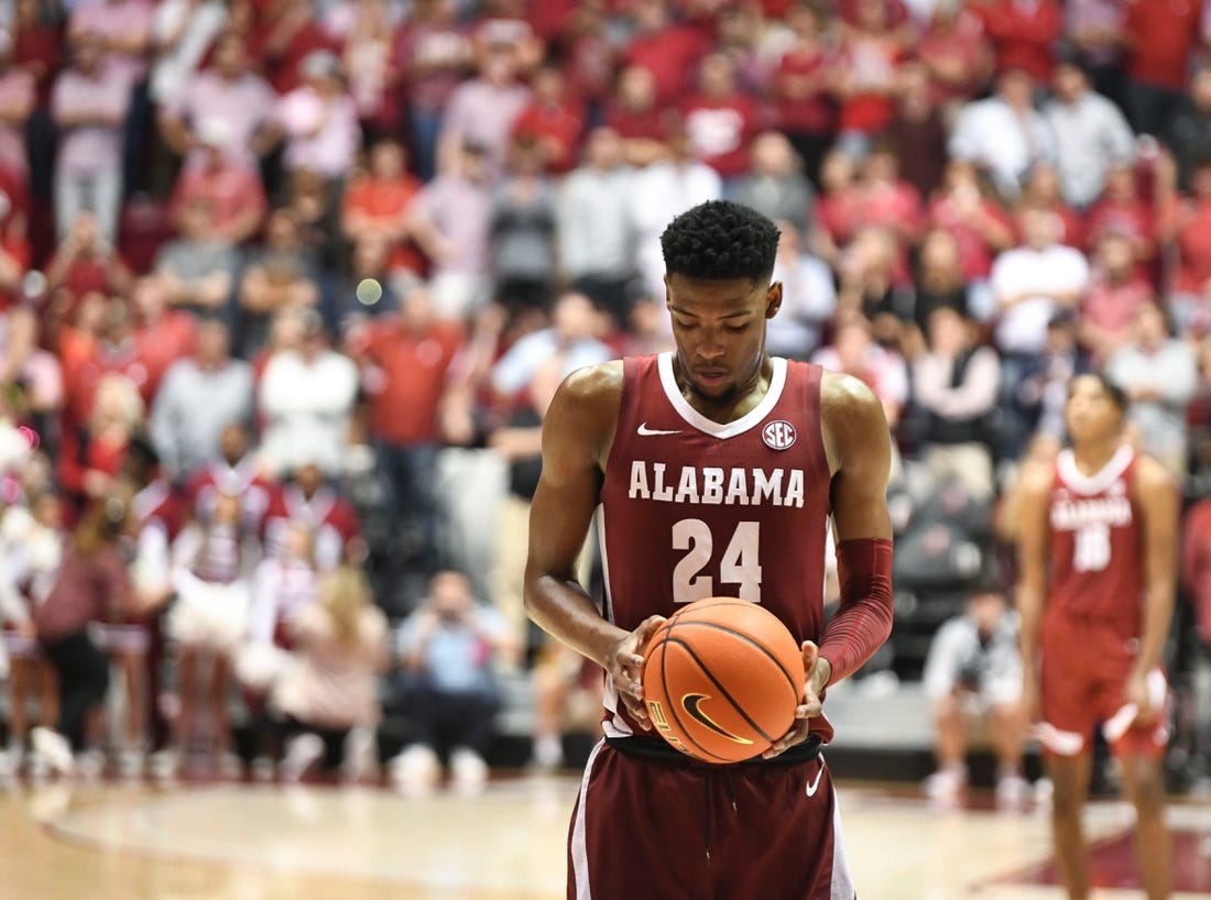 Mar 1, 2023; Tuscaloosa, AL, USA; Alabama forward Brandon Miller (24) comes to the free throw game in overtime at Coleman Coliseum. Alabama defeated Auburn 90-85 in overtime to claim the regular season SEC Championship.

Ncaa Basketball Auburn Tigers At Alabama Crimson Tide