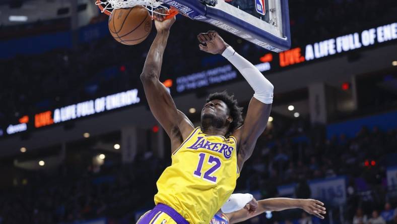 Mar 1, 2023; Oklahoma City, Oklahoma, USA; Los Angeles Lakers center Mo Bamba (12) dunks against the Oklahoma City Thunder during the second half at Paycom Center.  Mandatory Credit: Alonzo Adams-USA TODAY Sports