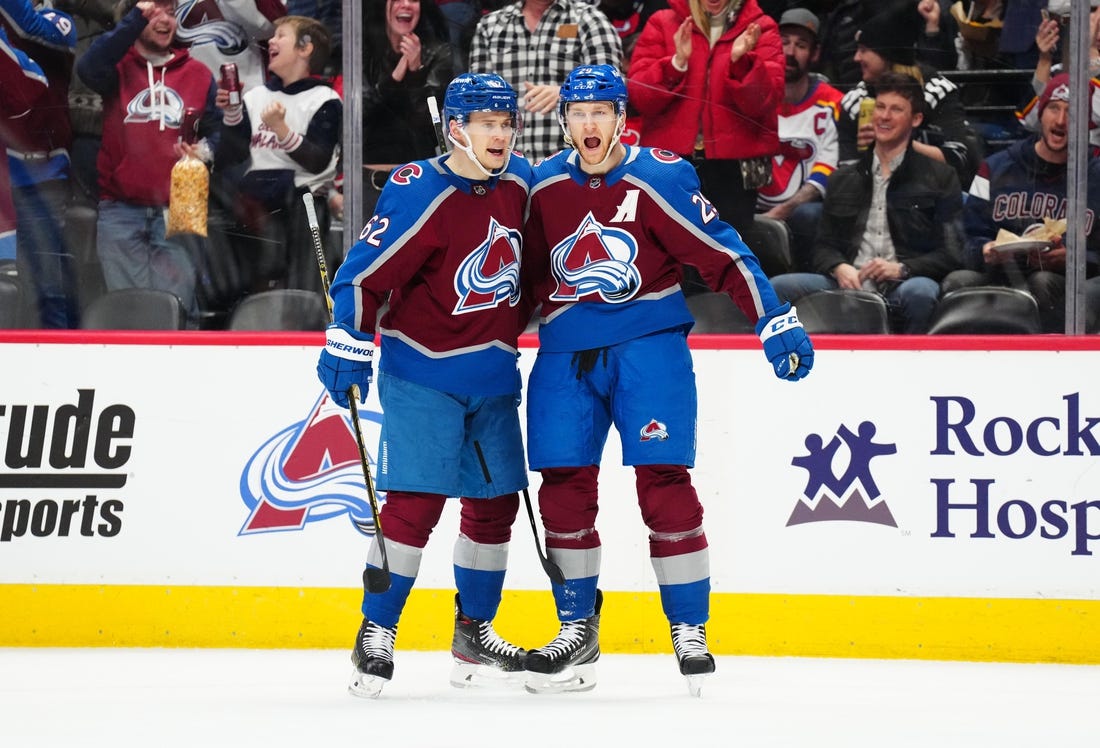 Mar 1, 2023; Denver, Colorado, USA; Colorado Avalanche center Nathan MacKinnon (29) celebrates his goal with left wing Artturi Lehkonen (62) in the second period against the New Jersey Devils at Ball Arena. Mandatory Credit: Ron Chenoy-USA TODAY Sports