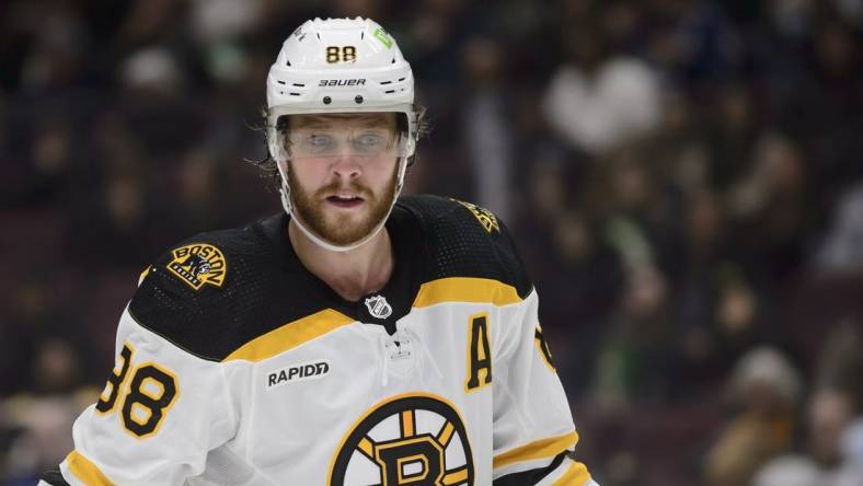 Feb 25, 2023; Vancouver, British Columbia, CAN;  Boston Bruins forward David Pastrnak  (88) awaits the start of play against the Vancouver Canucks during the second period at Rogers Arena. Mandatory Credit: Anne-Marie Sorvin-USA TODAY Sports