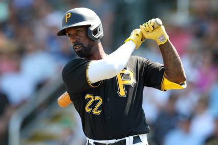 Mar 2, 2023; Bradenton, Florida, USA;  Pittsburgh Pirates left fielder Andrew McCutchen (22) steps to the plat against the New York Yankees in the first inning during spring training at LECOM Park. Mandatory Credit: Nathan Ray Seebeck-USA TODAY Sports