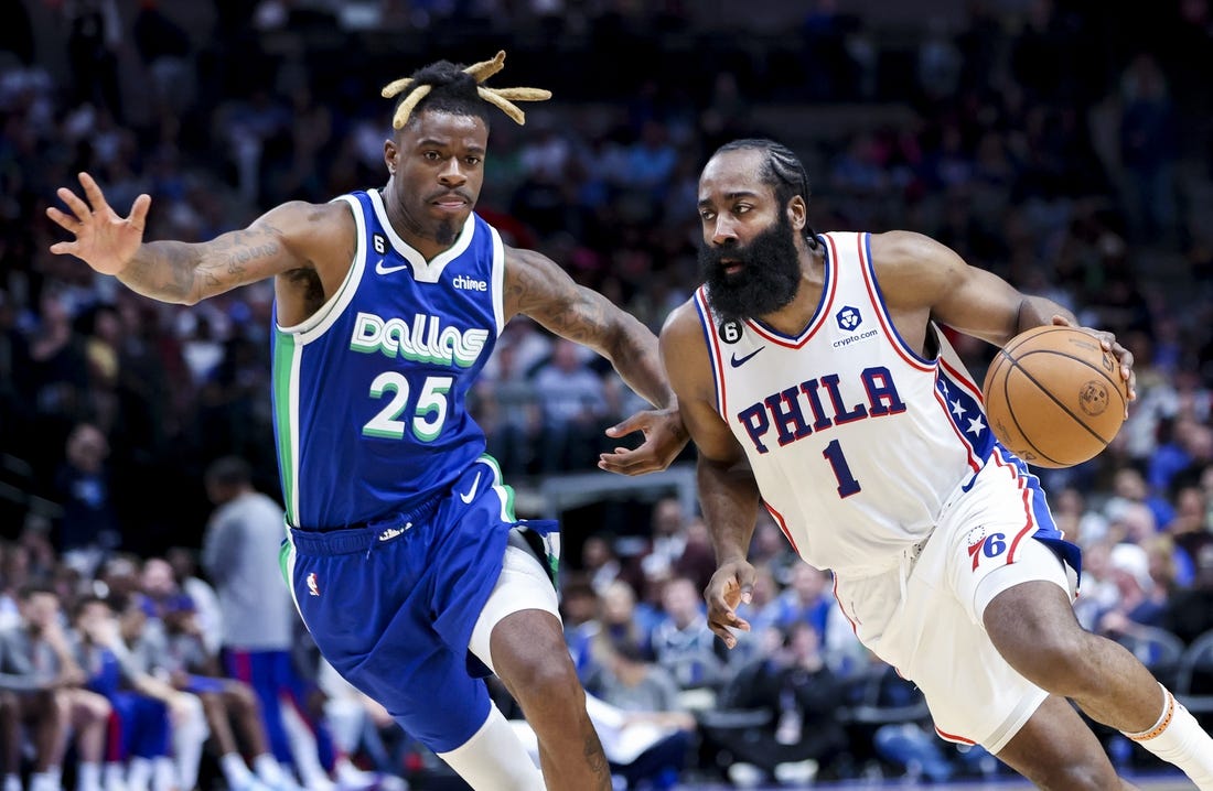 Mar 2, 2023; Dallas, Texas, USA;  Philadelphia 76ers guard James Harden (1) drives to the basket as Dallas Mavericks forward Reggie Bullock (25) defends during the second half at American Airlines Center. Mandatory Credit: Kevin Jairaj-USA TODAY Sports